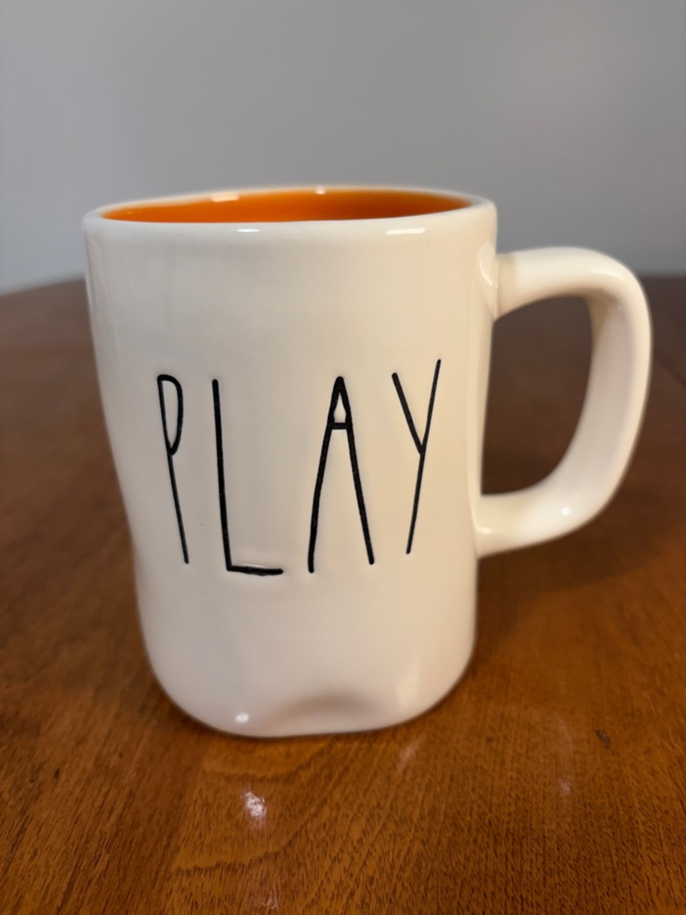 Rae Dunn PLAY Mug Orange Interior
